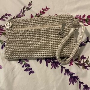 The Sak Silver Crochet Wristlet Clutch with Wrist Strap